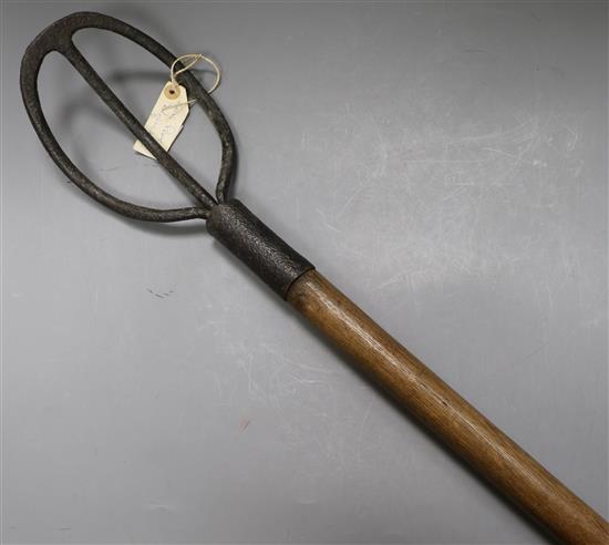 A rare Victorian ash handled cow pat knocker